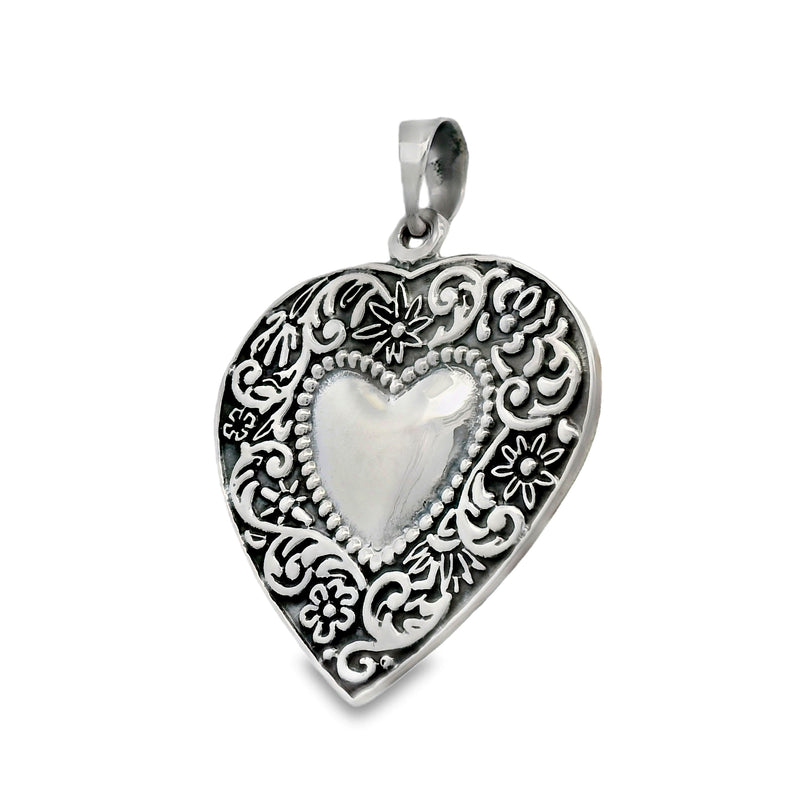 Dije de Corazon Pavonado